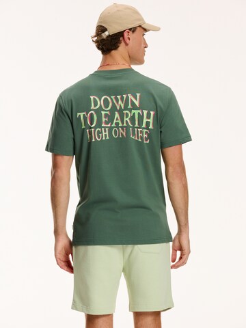žalia Shiwi Marškinėliai