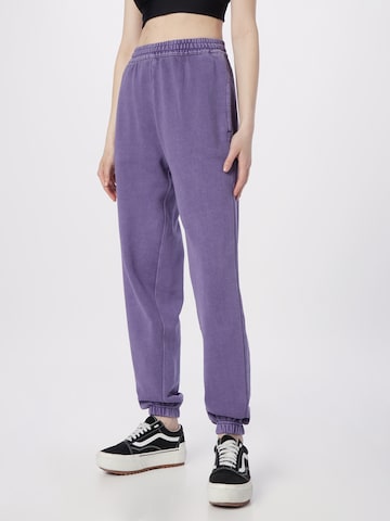 Carhartt WIP Tapered Pants 'Nelson' in Purple: front