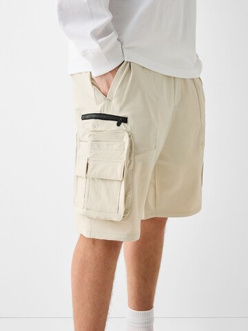 Bershka Regular Shorts in Beige