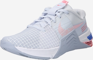 Chaussure de sport NIKE en gris : devant