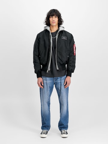 ALPHA INDUSTRIES Välikausitakki 'MA-1 D-Tec' värissä musta: etupuoli