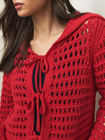 sarkans Next Adīta jaka