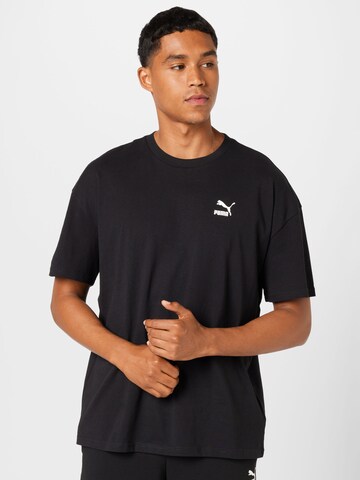 PUMA - Camiseta en negro: frente