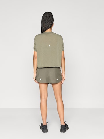 ASICS tavaline Spordipüksid 'NAGINO', värv roheline