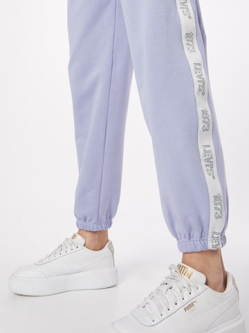 LEVI'S ® - Tapered Calças 'Graphic Laundry Sweatpnt' em roxo