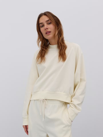 EDITED Sweatshirt 'Aura' i beige: forside