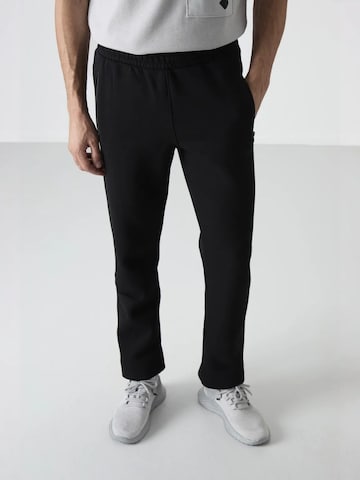Pantaloni di Tommy Life in nero: frontale