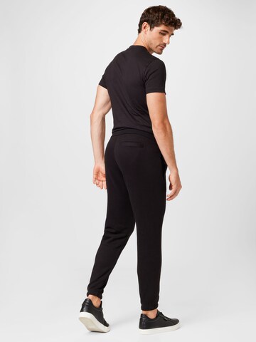 Calvin Klein Tapered Trousers in Black