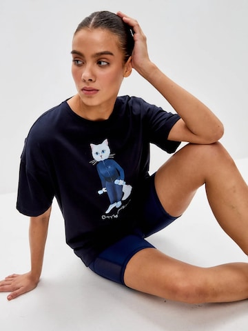 T-shirt 'Sport cat with dumbbells' Cat e Lolette en bleu