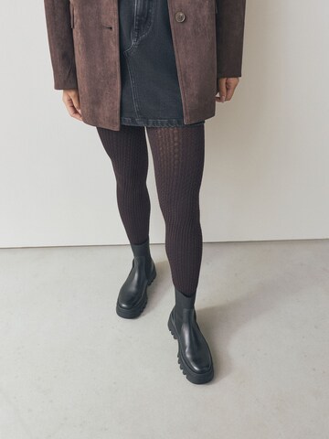 Next - Leotardos en marrón