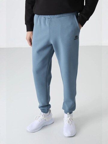 Tommy Life - Skinny Calças de desporto 'Jogginghose' em azul