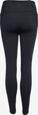 Skinny Pantaloni sportivi di Spyder in nero