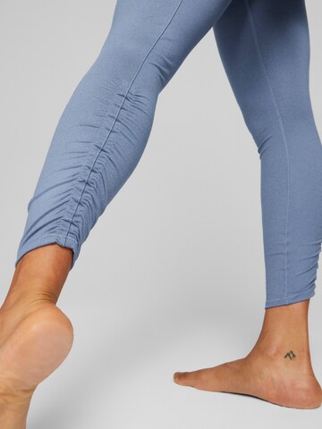 PUMA Skinny Sportbroek 'STUDIO FOUNDATION' in Blauw