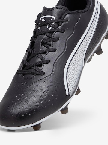 Chaussure de foot 'King Match' PUMA en noir