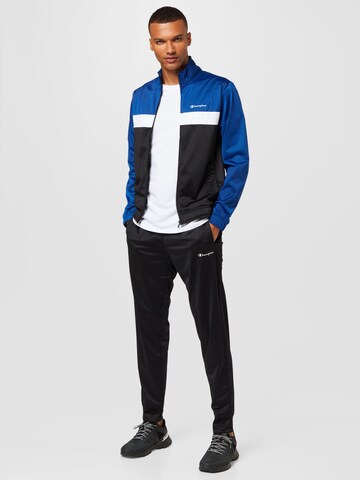 Champion Authentic Athletic Apparel Trainingspak in Blauw