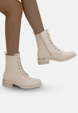 Elara Schnürstiefelette in Beige