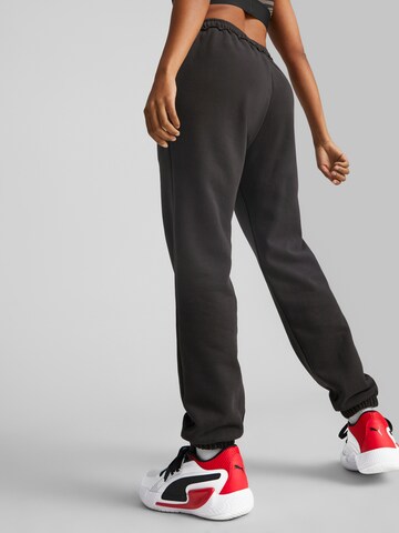 PUMA Tapered Sportbroek in Zwart