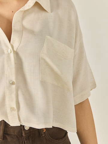 Bianco Lucci Blus i beige