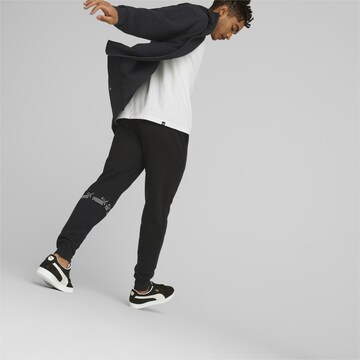 PUMA Tapered Sportbroek in Zwart