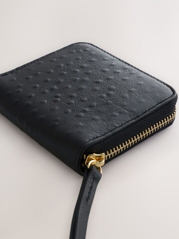 Next Kukkaro värissä musta