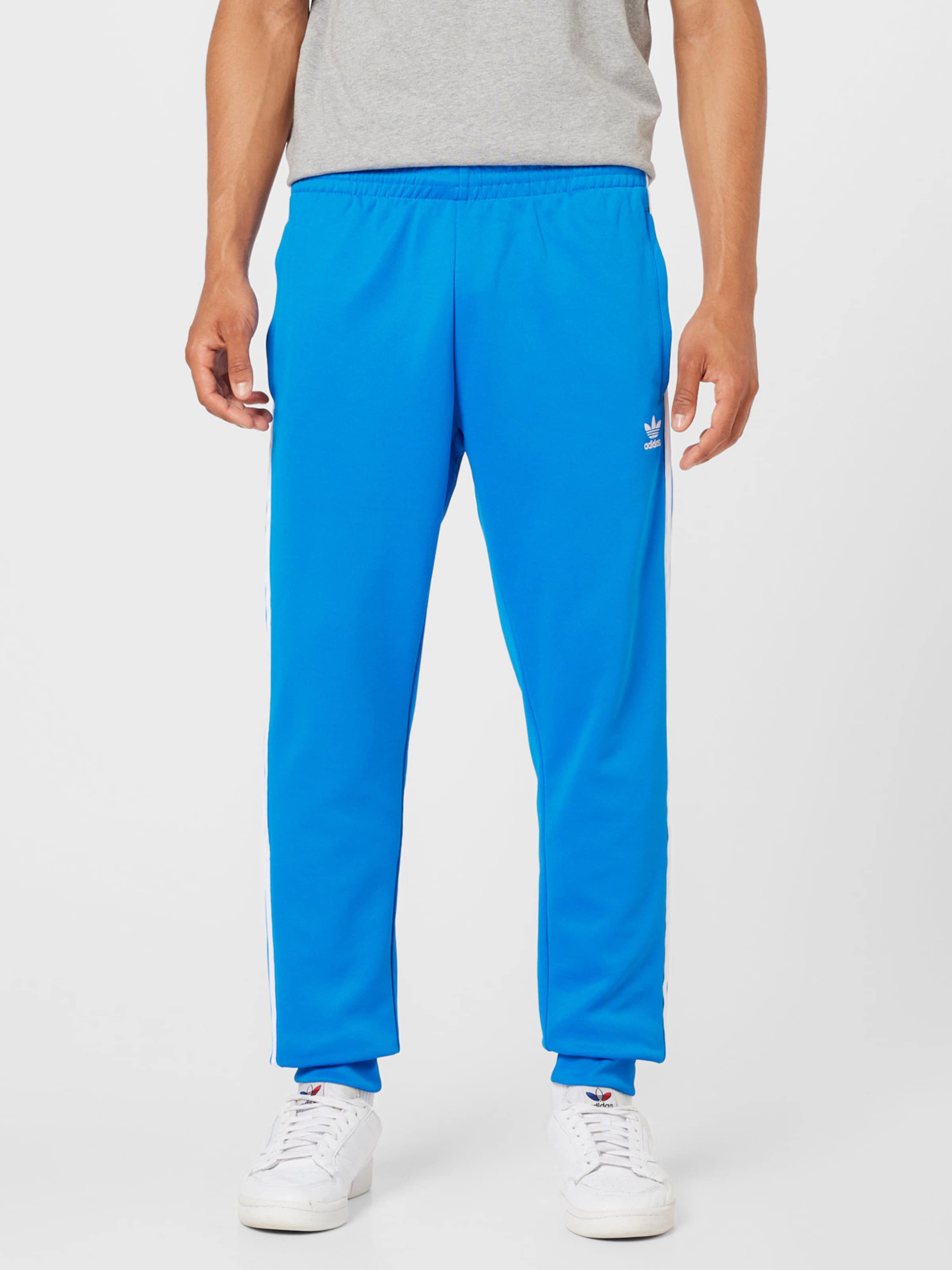 Originals superstar track pants blue sale