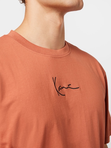 T-Shirt Karl Kani en orange