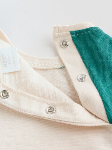 Next Strampler in Beige