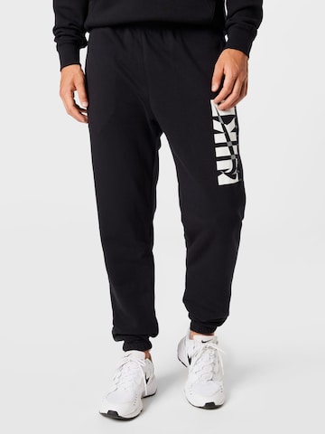 Nike Sportswear Trainingspak in Zwart