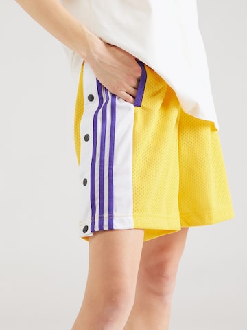 ADIDAS ORIGINALS Loose fit Workout Pants in Yellow