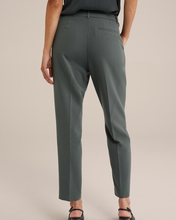 Slimfit Pantaloni con piega frontale di WE Fashion in verde