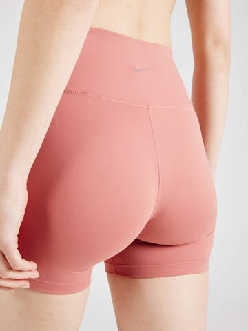 Skinny Pantaloni sportivi 'ONE' di NIKE in rosa