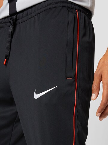 Regular Pantalon de sport 'FC Libero' NIKE en noir