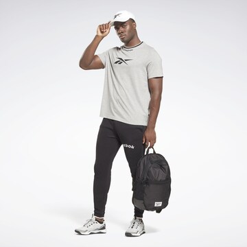 Reebok - Tapered Calças de desporto em preto