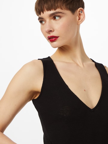 GLAMOROUS Bodysuit in Schwarz