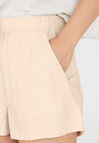 Athlecia Loose fit Sports trousers 'Resort' in Brown