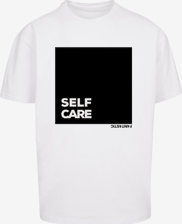 T-Shirt 'SELF CARE' F4NT4STIC en blanc : devant