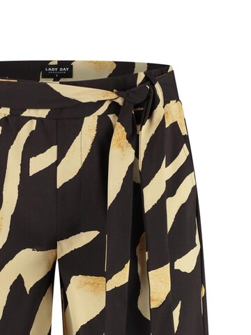 Lady Day Regular Trousers 'Lady Day Shorty Pania print' in Brown