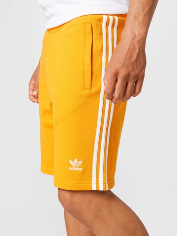 ADIDAS ORIGINALS Regular Pants '3-Stripes' in Yellow