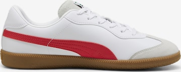 Chaussure de foot 'KING 21 IT' PUMA en blanc