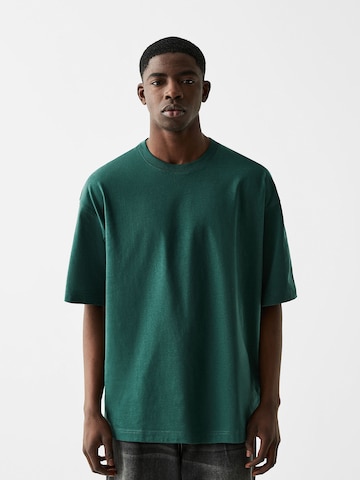 Bershka Koszulka w kolorze zielony: przód