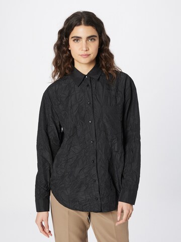Oval Square - Blusa en negro: frente