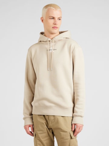 Sweat-shirt Calvin Klein Jeans en beige : devant