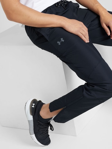 Slimfit Pantaloni sportivi 'Legacy Windbreaker' di UNDER ARMOUR in nero