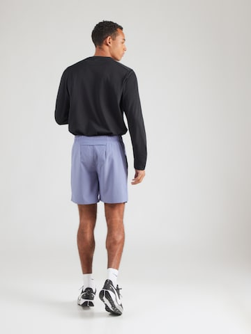 Regular Pantaloni sport 'CHALLENGER' de la NIKE pe mov: spate
