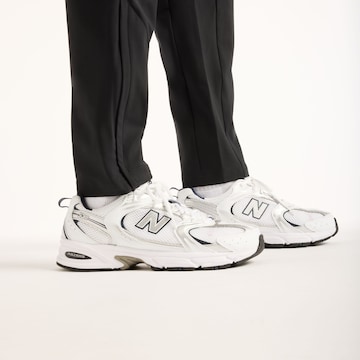 regular Pantaloni sportivi 'Utility' di new balance in nero