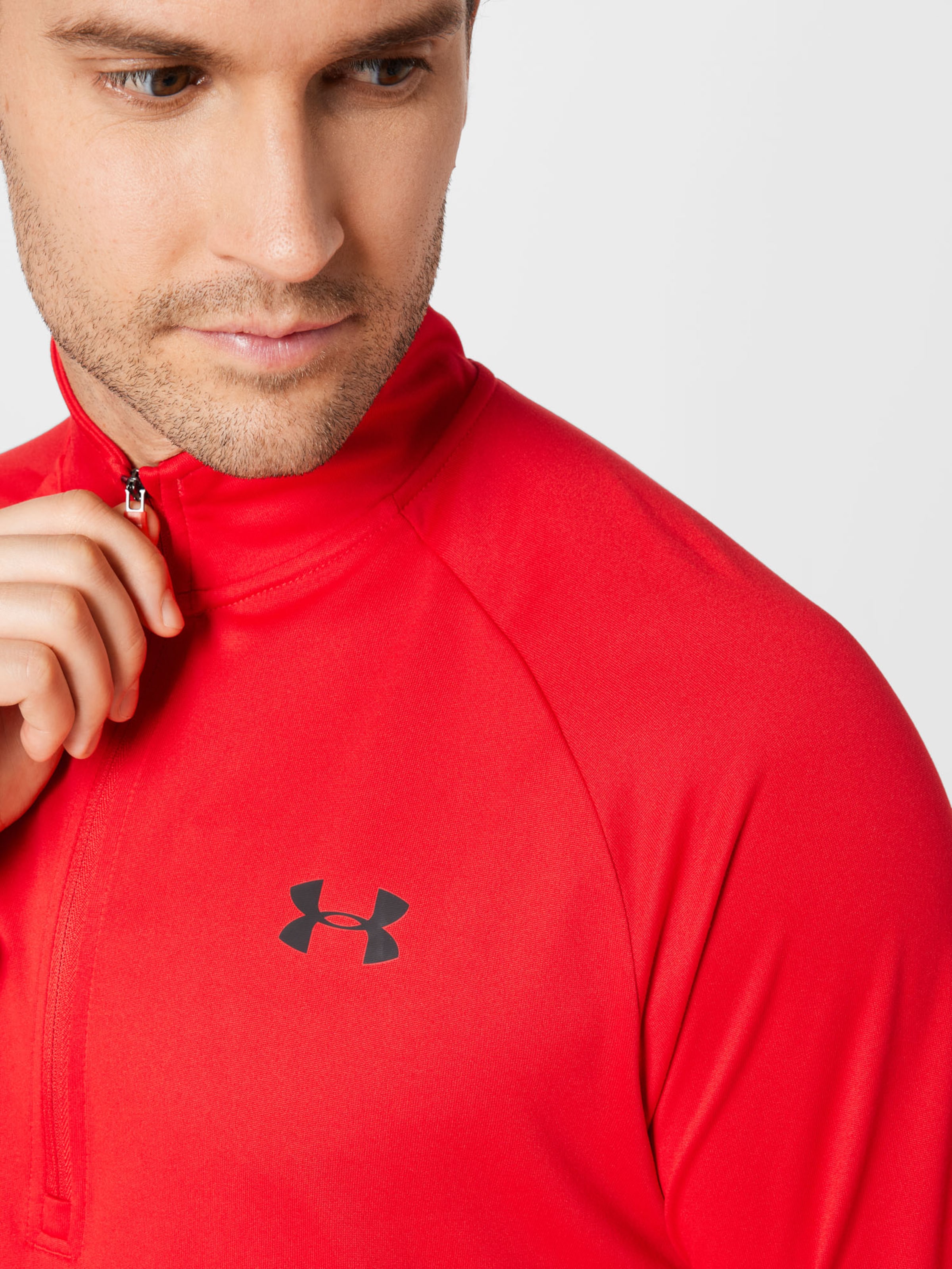 Disciplines sportives T-Shirt fonctionnel UNDER ARMOUR en Rouge 