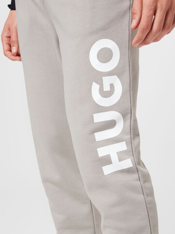 Tapered Pantaloni 'Dutschi' di HUGO in beige