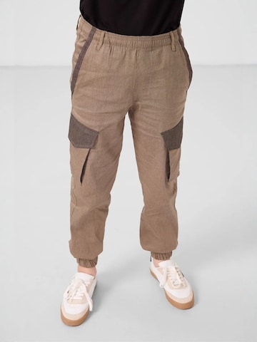 Pantalon 'TOMMY Kinder Cargo-Joggerhose' Tommy Life en marron