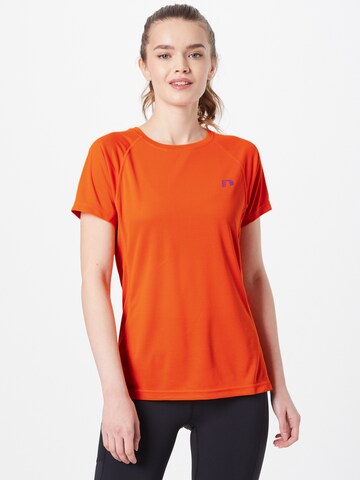 Newline - Camisa funcionais em laranja: frente