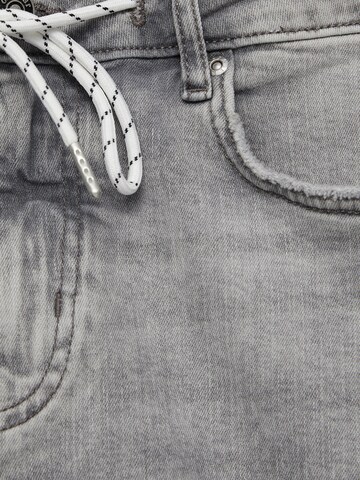Skinny Jeans di Pull&Bear in grigio